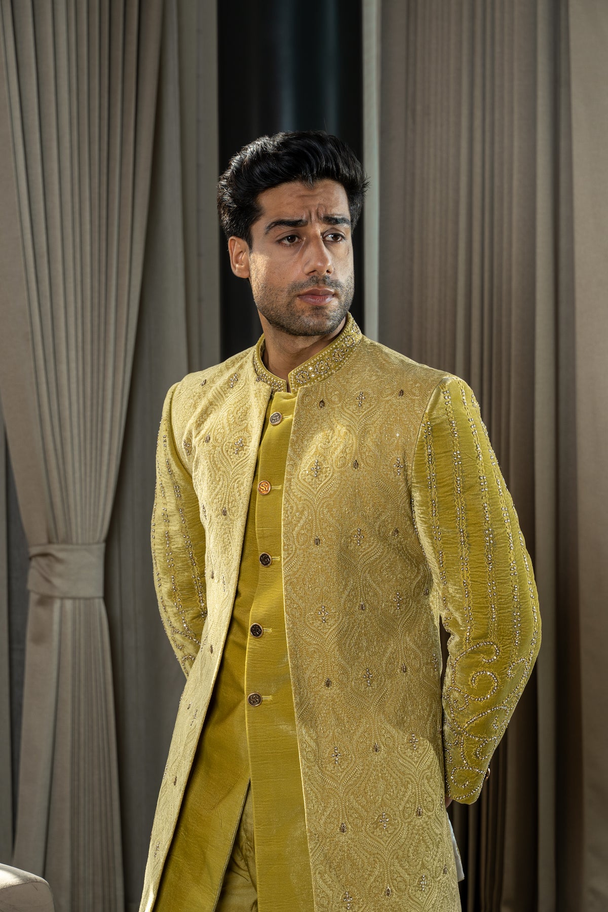 This gold yellow velvet long jodhpuri